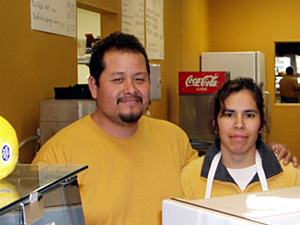 
Miguel and Letitia Jiminez own Fiesta restaurant in Chaska.  They say they haven't experienced any inter-ethnic tension in the town. (MPR Photo/Brandt Williams)
