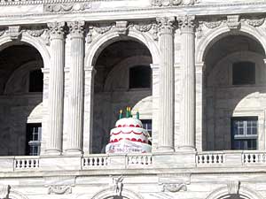 
A "faux" birthday cake was displayed in one of the Capitol's exterior windows. (MPR Photo/William Wilcoxen)