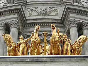 
One of the most distinctive features of the Capitol is the Quadriga -- the gilded sculpture of four horses, a chariot and three human figures -- that crown the main entrance.
 (MPR Photo/Marianne Combs)