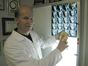 
Dr. Robert LaPrade explains the anatomy of the human knee. (MPR photo/Jim Bickal)