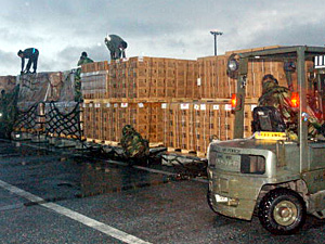
 In this handout image provided by the U.S. Department of Defense, airmen from the 733rd Air Mobility Squadron and the 18th Services Squadron help process aircraft pallets of Meals Ready to Eat  at Kadena Air Base, Japan. The MREs are bound for Southeast Asia as part of U.S. disaster relief efforts following the massive earthquake and tsunami that struck Sunday off the coast of Indonesia and throughout the Indian Ocean region. (Photo by Richard Freeland/DOD via Getty Images)