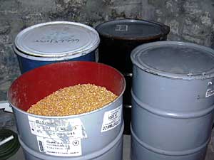 
Each of these barrels holds about 350 pounds of corn, and costs $16. One barrel will heat an average home for about a week.  (MPR Photo/Mike Mulcahy)