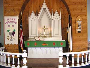 
The white and gold painted altar at Carmel Lutheran Church might have been copied from the original Lutheran church in Germany. (MPR Photo/Stephanie Hemphill)