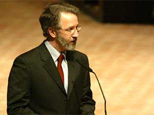 
McCarthy's son, Michael, read several of his father's poems to the audience. McCarthy said his father wanted to be remembered as a poet interested in politics, rather than a politician who liked poetry.  (Photo by Andra Van Kempen)