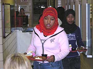 
The Pelican Rapids High School has a diverse student population.  Students filing through the lunch line at the Pelican Rapids High School. For 25 percent of the students, English is a new language. (MPR Photo/Bob Reha)