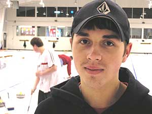 
Bemidji High School senior Cody Rohde says he loves to curl. He's looking forward to keeping track of the U.S. Olympic teams over the next few weeks. (MPR photo/Tom Robertson)