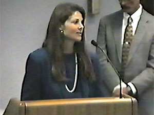
Sheryl Corrigan, who worked for 3M at the time, appeared at a Cottage Grove City Council meeting in 1998. She assured residents that water flowing from the Woodbury landfill to the Mississippi River was clean. Corrigan is now head of the MPCA. (Video capture, courtesy of South Washington County Telecommunications Commission)