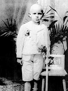 
Karol Wojtyla poses with a candle in his hand after receiving First Communion in the 1930s.   (Photo by STF/AFP/Getty Images)