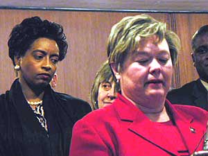 
Sen. Linda Higgins, right, says Minneapolis needs support of residents all over the state to overcome "the violent consequences" of budget cuts. On the left is City Council member Natalie Johnson Lee.  (MPR Photo/Art Hughes)