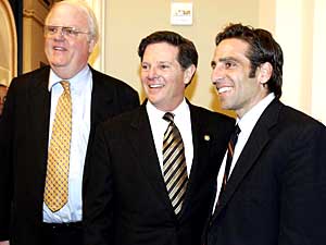 
U.S. House Majority Leader Rep. Tom DeLay (R-TX) (C) and Rep. James Sensenbrenner Jr. (R-WI) (L) congratulate Terri Schiavo's brother, Bobby Schindler (R), after the House passed legislation to let a federal judge decide whether to prolong Schiavo's life. The Senate then passed the same bill in a special Sunday session, and President Bush signed it into law early Monday.   (Photo by Alex Wong/Getty Images)