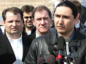 
Floyd Jourdian Jr., (R) Red Lake tribal chair, addresses the media Tuesday, along with U.S. Attorney Tom Heffelfinger (C) and FBI special agent Paul McCabe (L) on the Red Lake Indian Reservation.
 (Photo by JEFF HAYNES/AFP/Getty Images)