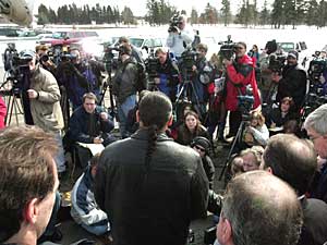 
Tribal chair Floyd Jourdain (back to the camera) faces a huge crowd of reporters during a news conference Tuesday in Red Lake.  (Photo by Scott Olson/Getty Images)