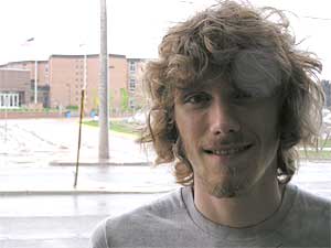 
Bloomington Kennedy High School senior Brandon Madsen is opposed to the war and Iraq and efforts to recruit new soldiers to fight there. Madsen is an organizer with the group, "Youth Against War and Racism," which he says tells Bloomington Kennedy students what recruiter don't. (MPR Photo/ Mark Zdechlik)