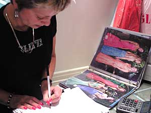 
Sue Mills managaes Glitz. She says prom is an appointment time in the life of a teenage girl. (MPR Photo/Bianca Vazquez Toness)