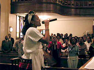 
A soloist revs up the Oromo congregation at Bethany Lutheran Church in Minneapolis. (MPR Photo/Art Hughes)