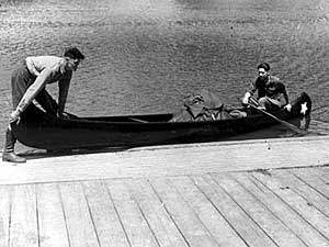 
Eric Sevareid, on the left, and Walter Port, on the right, shove off for a 2,250 mile journey from Minneapolis to Hudson Bay in 1930.  They completed the trip but it was filled with challenges.  (Photo courtesty Minnesota Historical Society)