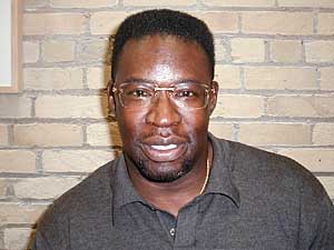 
Reginald Sweet works with ex-cons who come to Amicus for help with housing and finding a job. (MPR photo/Dan Olson)