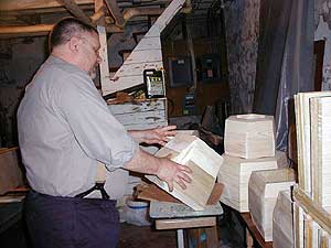 
Royce builds his funerary urns in his basement. Once the base is completed, he takes them up to his attic studio for more detailed work and painting.  (MPR Photo/Marianne Combs)