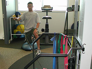 
Twins pitcher Grant Balfour also uses elastic chords to build strength in his arm.  (MPR Photo/ Eugene Cha)