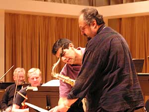 
Conductor Miguel Harth-Bedoya and saxophonist Joe Lovano discuss the score ((MPR photo/Karl Gehrke))