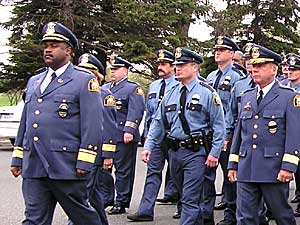 
St. Paul Police Chief John Harrington leads his officers into the church for Sgt. Vick's funeral. (MPR Photo/Tom Scheck)