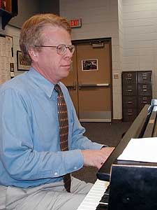 
Composer Cary John Franklin spent the past three years working with high school choirs.  He wrote a piece specifically for the Red Wing choir entitled Wild Geese.  That piece and his new rendition of Gloria will be performed at Orchestra Hall in Minneapolis. (MPR Photo/Erin Galbally)