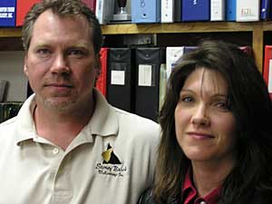 
Mike and Tammy Conroy fear air and water pollution from the feedlot will force them off their farm.  (MPR photo/Dan Gunderson)