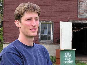 
Janaki Fisher-Merritt and his girlfriend couldn't resist buying a barn and house two years ago.  Now they're putting the barn to good use, inviting friends to watch movies in the hayloft, and organizing an independent film festival. (MPR Photo/Stephanie Hemphill)