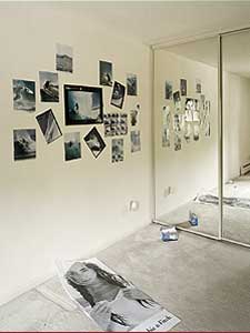 
Reflections of pictures. Marchetti has discovered that when many suburban renters an apartment, some small artifact of their existence remains. (Image courtesy of Anthony Marchetti)