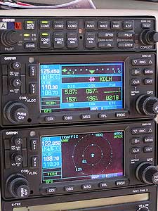 
Cirrus introduced what's known as the "glass cockpit" into general aviation aircraft.  The digital screens give the pilot information like route, weather, alititude, pitch, and the location of other airplanes. (MPR Photo/Bob Kelleher)