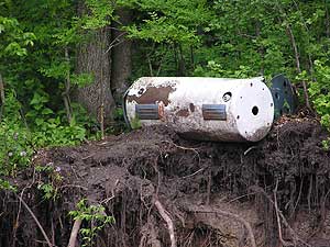 
It's not hard to find junk like this water heater along the banks of southern Minnesota rivers.  Some is recent, but most is from an era 40 or more years ago when river banks were used as dump sites.   (MPR Photo/Mark Steil)