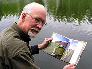 
Author Will Weaver wrote a small novel to accompany Doug Ohman's photographs for the new book "Barns of Minnesota." Weaver, a Bemidji State University English professor, says barns are rural icons and symbols of a lifestyle that's nearly disappeared. (MPR photo/Tom Robertson)