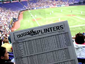 
The "Dugout Splinters" section of Gameday features lots of statistics and opinions about the teams in the current series. It also lists the salaries of each of the players.  (MPR Photo/Jim Bickal)