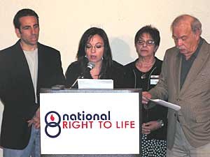
Terry Schiavo's family, from left -- brother Bobby Schindler, sister Suzanne Vitadamo, mother Mary Schindler, father Bob Schindler, released a statement about Schiavo's autopsy results Thursday in the Twin Cities. (MPR Photo/Lorna Benson)