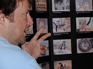 
Art director Karl Madcharo, discussing the storyboard for another ad called "Blazing Chickens," says good ideas can come while hanging out in a bookstore or playing foosball. (MPR Photo/Jeff Horwich)
