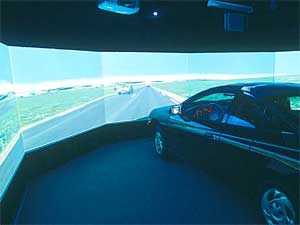 
Researchers use the U of M's driving simulator to test driver assistance technology including new ways to warn drivers when it's safe to enter roadways (Photo courtesy U of M Center for Transportation Studies)