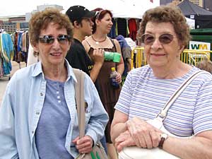 
Bethel Kordosky, right, says she thinks lawmakers are acting like a bunch of spoiled kids. "Fire 'em!" she says. Kordosky is shown with a friend, Carol Mahre, on the left.
 (MPR Photo/Annie Baxter)
