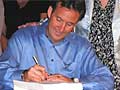 Pawlenty signs budget