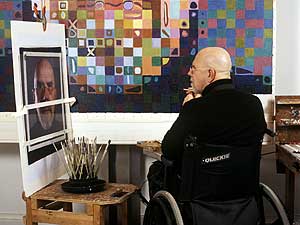 
Chuck Close at work in his New York Studio. (Photo courtesy of Walker Art Center)