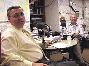 
Johnson and Sviggum share a light moment in the MPR Capitol bureau before appearing on the Midday program Monday July 11.  (MPR file photo)