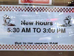 
Jim Theodorakakos isn't put out by paying his staff a higher wage.  It'll cost him less than it would have before the smoking ban.  He says the loss of business caused him to cut his staff in half. (MPR Photo/Annie Baxter)