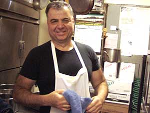 
Jim Theodorakakos says the higher minimum wage will drive up prices at his restaurant, the Coffee Cup, but he doesn't mind. On the other hand, he says the Ramsey County smoking ban has cut his business by 30 percent. 
 (MPR Photo/Annie Baxter)