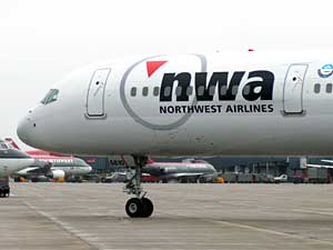 
Northwest Airlines says it needs to cut labor costs by hundreds of billions of dollars to remain competitive.  (Photo by Bill Alkofer/Getty Images)