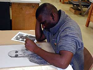 
Donovan Durham works on a sketch at the Highpoint Center (MPR Photo/Marianne Combs)