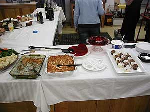 
At the opening the Highpoint Center presented some of Durham's favorite foods - green bean casserole, jello with whipped cream, and cupcakes. They're a big hit with the crowd.  (MPR Photo/Marianne Combs)