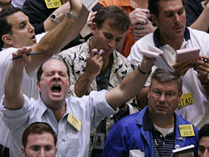 
Crude oil futures traders work on the floor of the Mercantile exchange  in New York City. Oil prices shot past the 70-dollar-a-barrel. (Photo by Stephen Chernin/Getty Images)