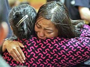 
Vang's sister Chou Vang, right, hugs his mother Sao Hang in the courtroom after the verdict was read. (AP Photo/Morry Gash, Pool)