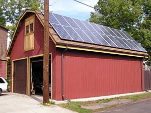 
Chris Born uses these solar panels to power appliances in his house.  (MPR Photo/Lorna Benson)