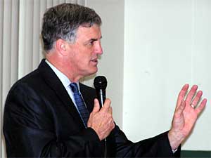 
Peter McLaughlin pointed to his leadership on development of the light rail transit line, in his position as a Hennepin County commissioner. "It's fair to say that no local official has done more work, and more effective work, on transit in this region than I have in the last 15 years," McLaughlin said.  (MPR Photo/Tom Scheck)