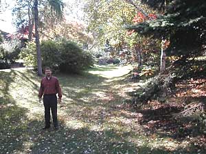 
Dan Huff says systems of grassy swales like this one, as well as rain gardens and natural ponds, do a better job of treating stormwater. (MPR photo/Dan Olson)